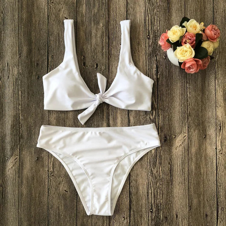 Women's pure colour bikini swimsuit in polyester fabric showing colour options