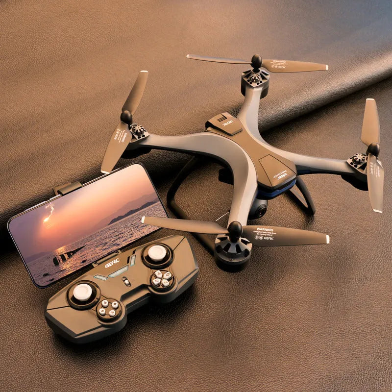 Plastic quadrocopter drone with remote controller and accessories including spare blades