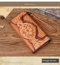 Women's brown tri-fold leather wallet with embossed floral pattern showing interior card slots