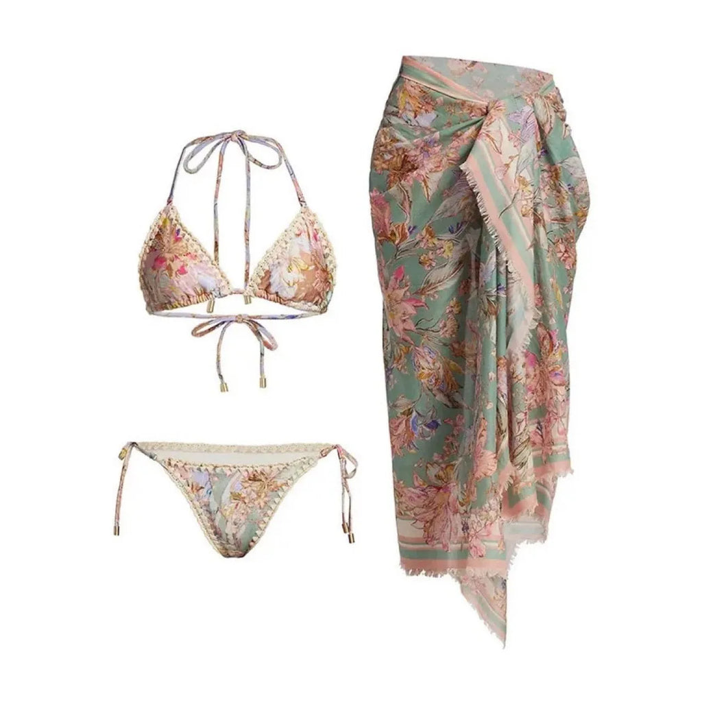 Women's floral bikini swimsuit set with top, briefs, and skirt in creamy-white beige colour
