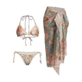 Women's floral bikini swimsuit set with top, briefs, and skirt in creamy-white beige colour