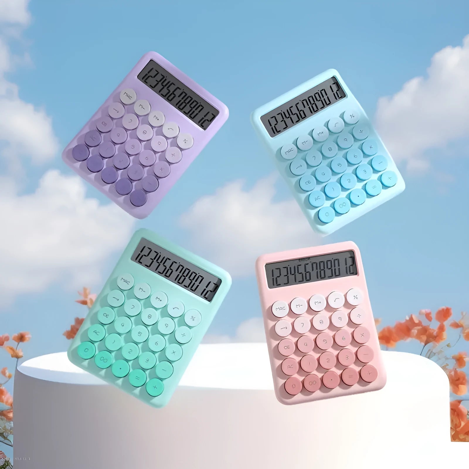 Gradient colour desk calculator in violet, pink, blue, or mint green on a desk