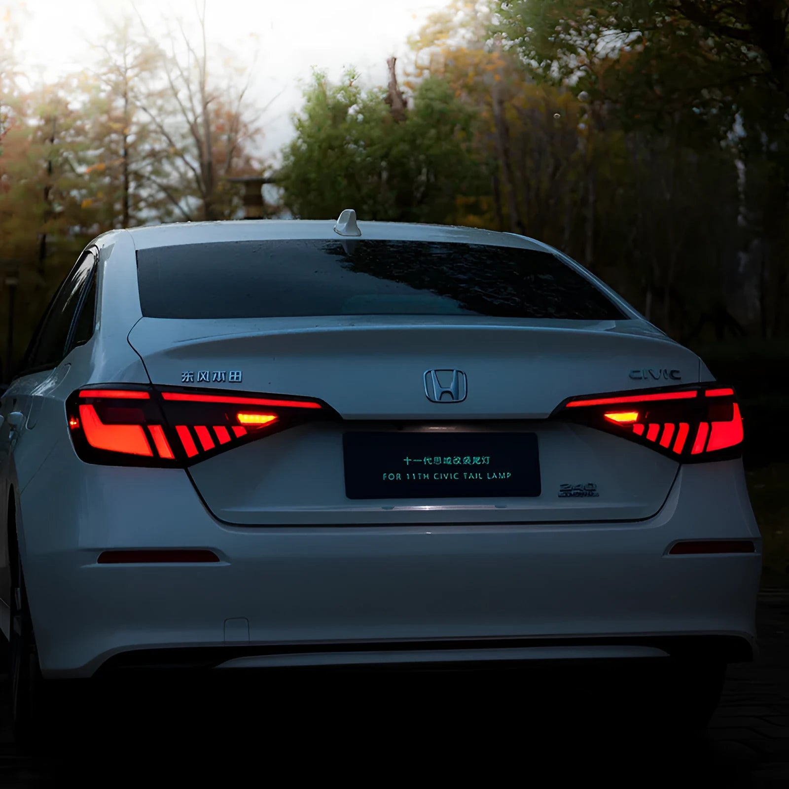 11th generation Honda Civic LED taillight assembly set showing black and red colour option with integrated lighting functions