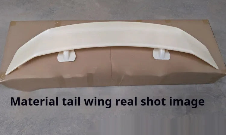 Universal car punch-free tail wing spoiler in ABS plastic on a vehicle