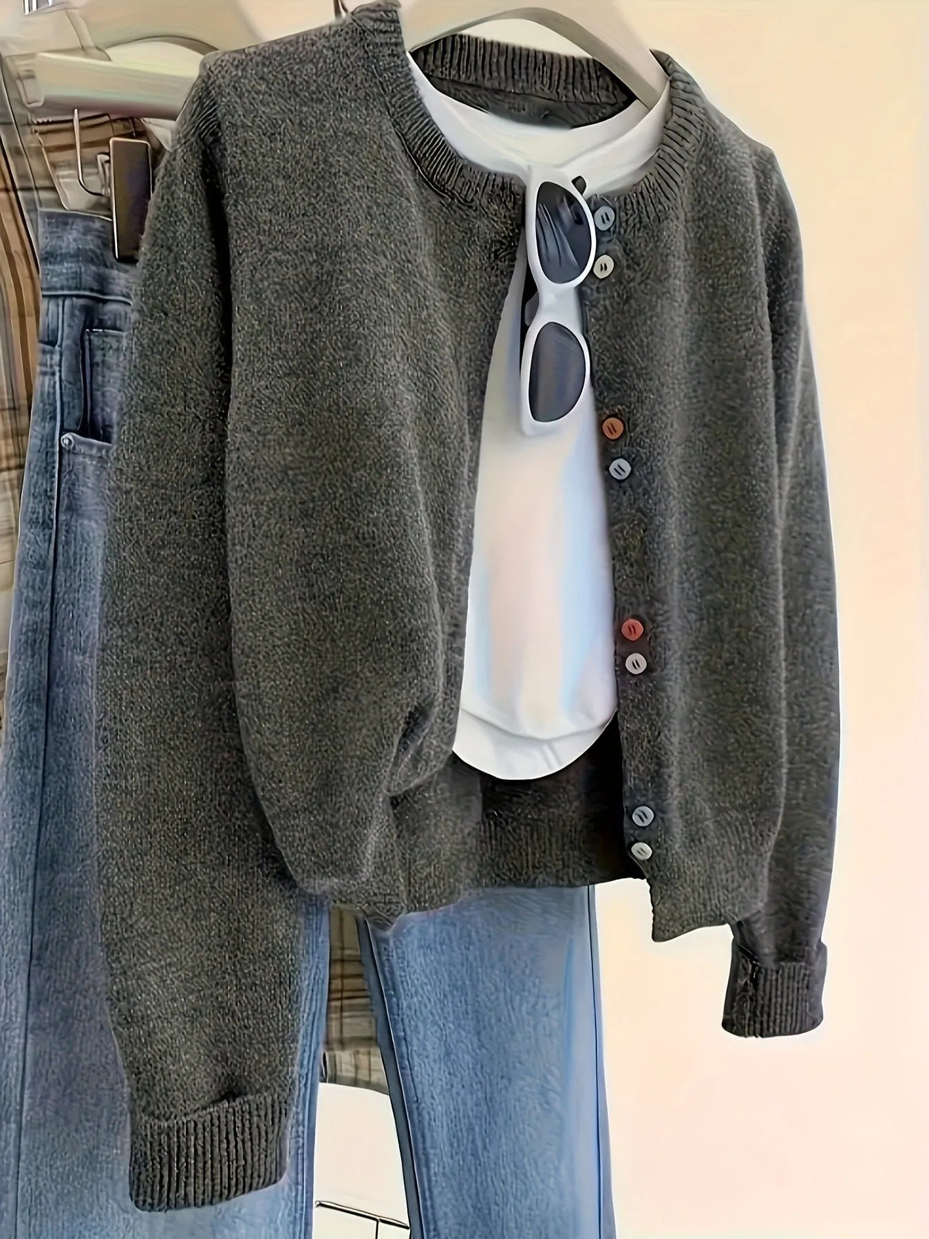Dark grey women's button-front cardigan sweater for commute and workwear layering