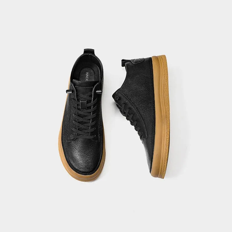 Men's black and white casual leather shoes with round toe and flat rubber sole
