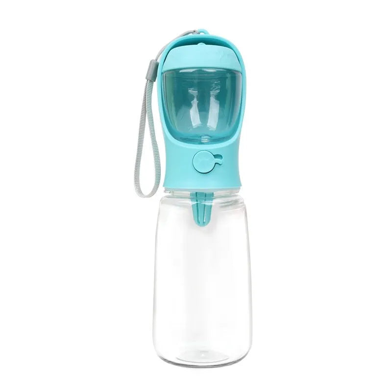 Blue portable plastic dog water bottle with integrated drinking trough for outings.
