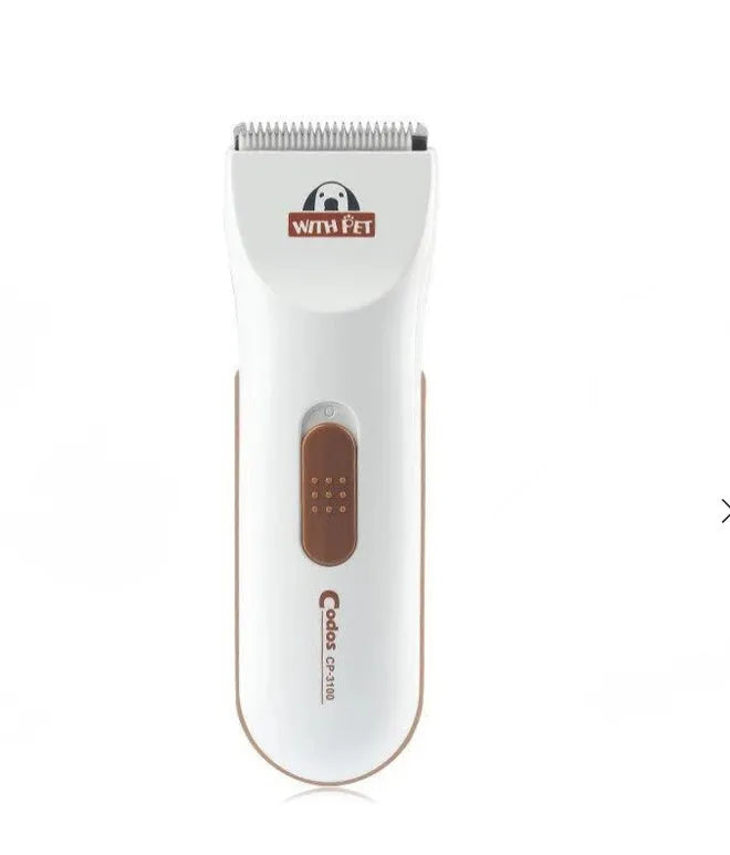 White electric pet hair clipper with ceramic blade on a table