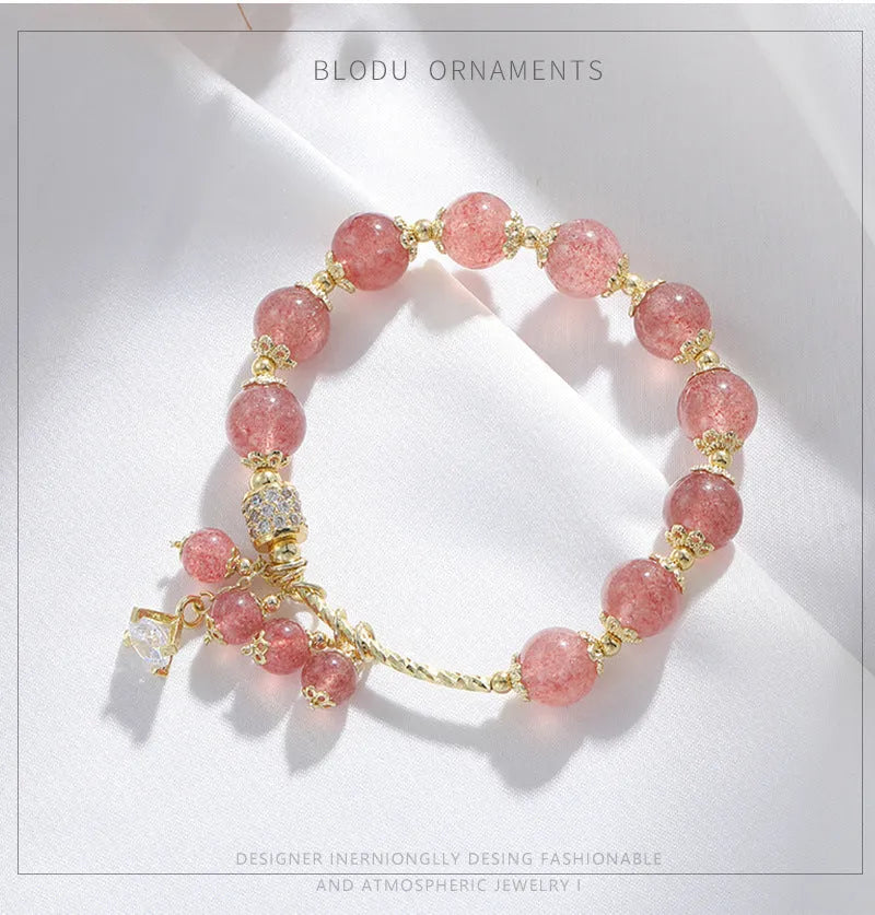 Pink women's bracelet with heart-shaped strawberry quartz crystal and pearl decorative elements