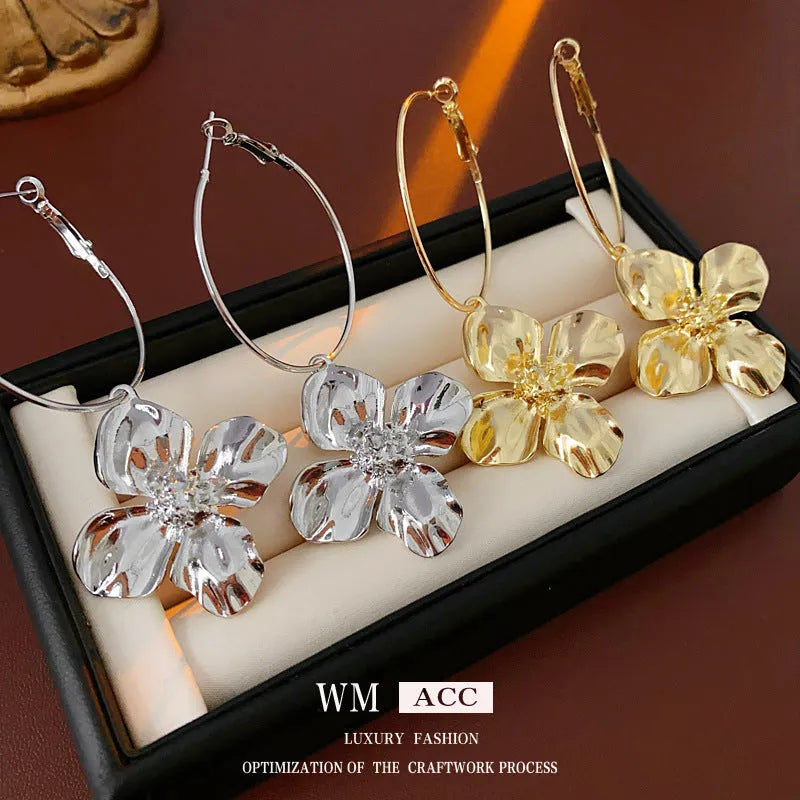 Silver needle metal flower earrings with geometric design in gold or silver electroplated finish