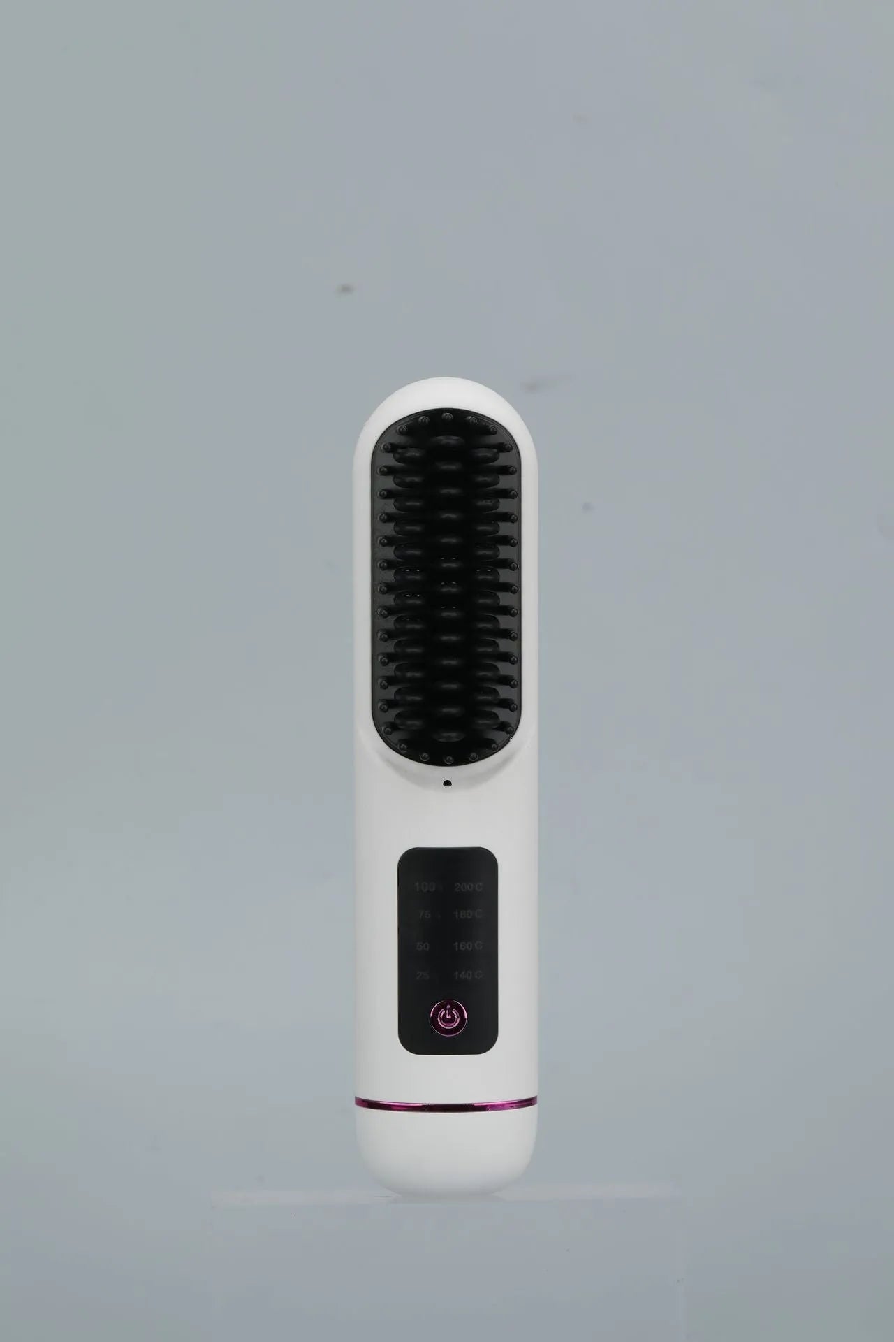 White, dark blue, and grey portable rechargeable negative ion hair comb for static control and straightening.
