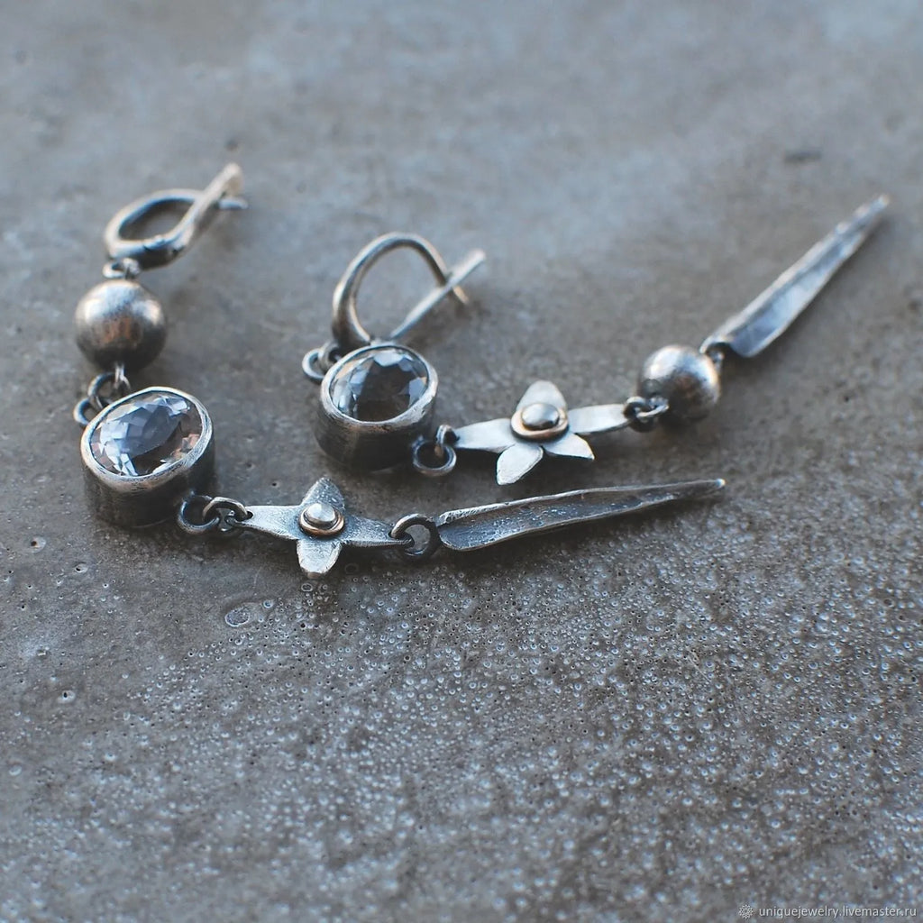 Geometric pendant earrings with antique silver plating and rhinestone detailing