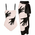Women's patterned one-piece bikini two-piece set with a light grey tulle skirt attached.