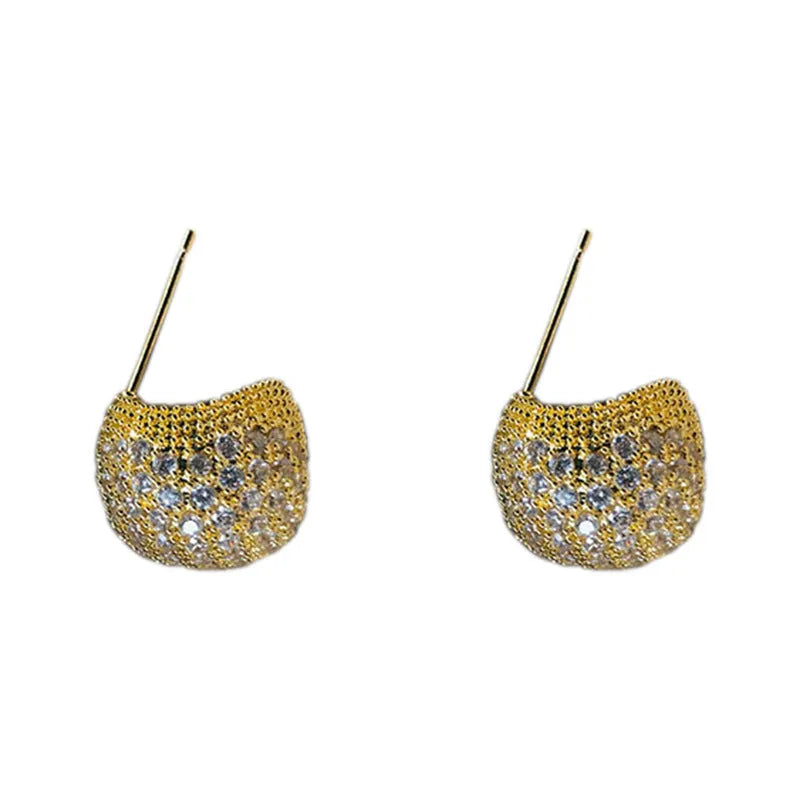 Gold geometric drop earrings with diamond patterning and sphere elements