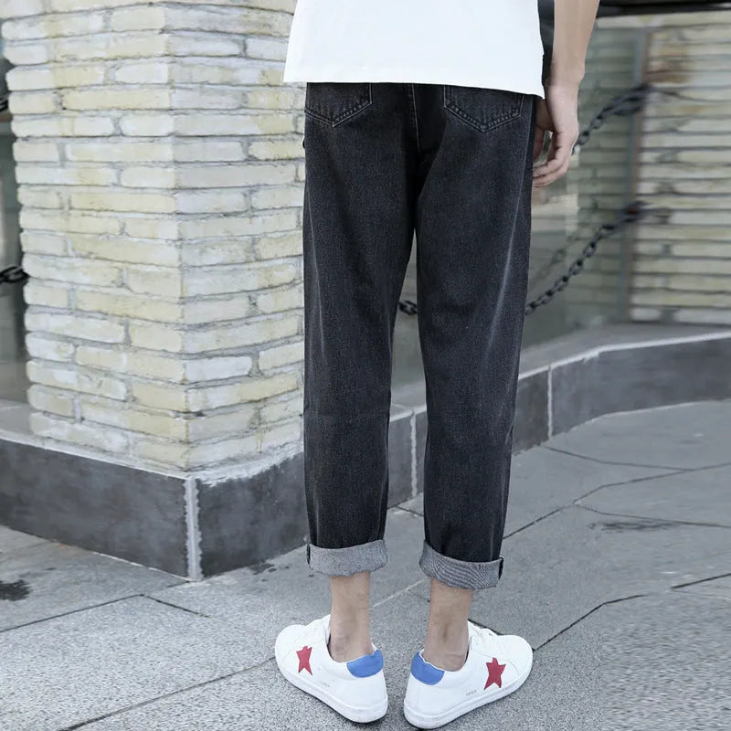 Men's black loose straight leg cotton jeans showing front and back views