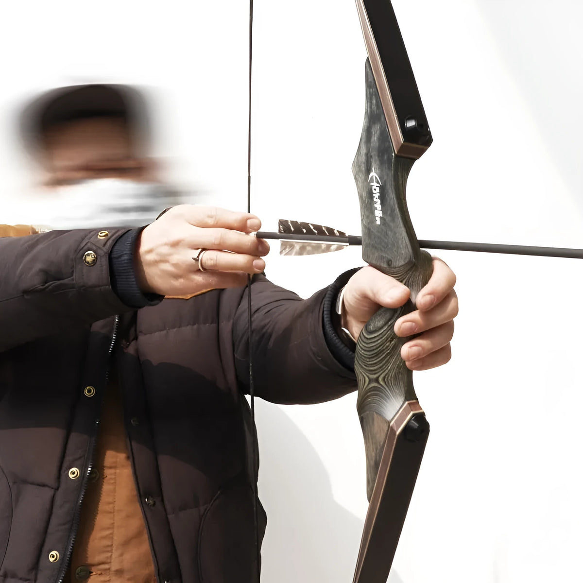 Wooden traditional recurve bow with colourful technology wood handle, glass fibre bamboo maple limbs, and 20-60 pound draw weights.