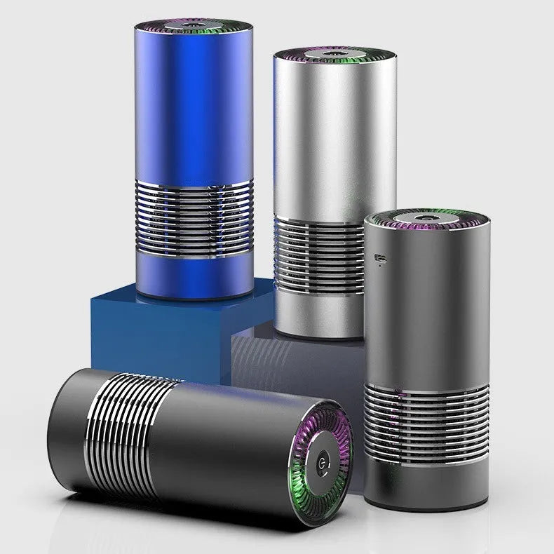 Compact metallic car air purifier on a dashboard with Black, Silver, and Grey colour options.