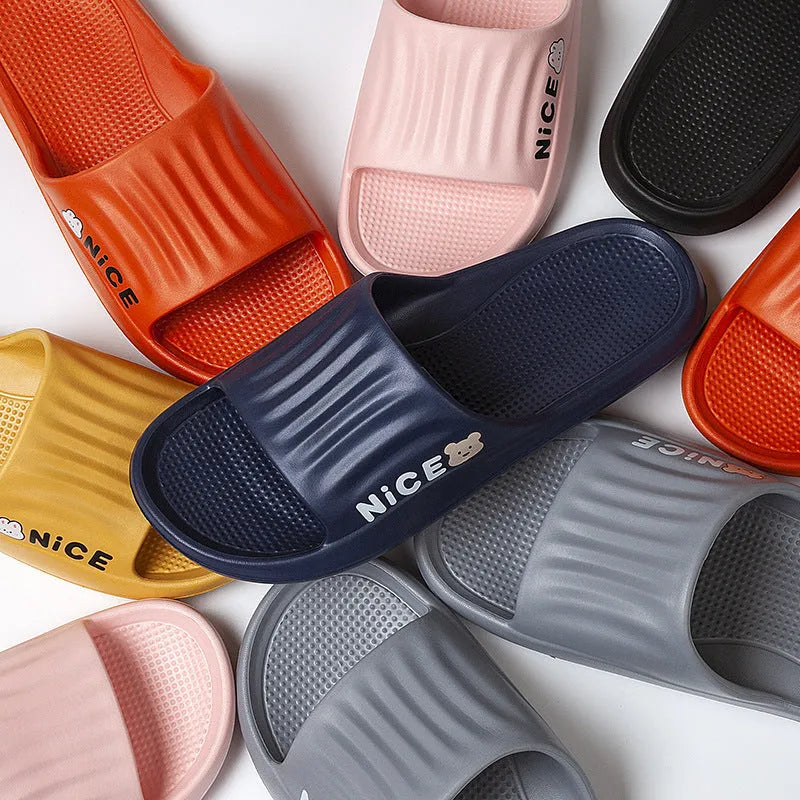 Cartoon pattern EVA slippers in various colours showing flip-flop style with non-slip soles