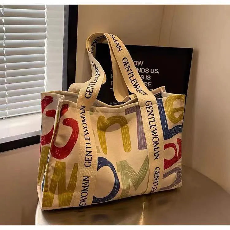 Large canvas tote bag with printing decoration in shoulder bag style