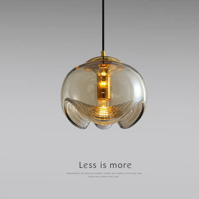 Modern glass chandelier with minimalist design showing transparent, amber and smoky grey light colour options