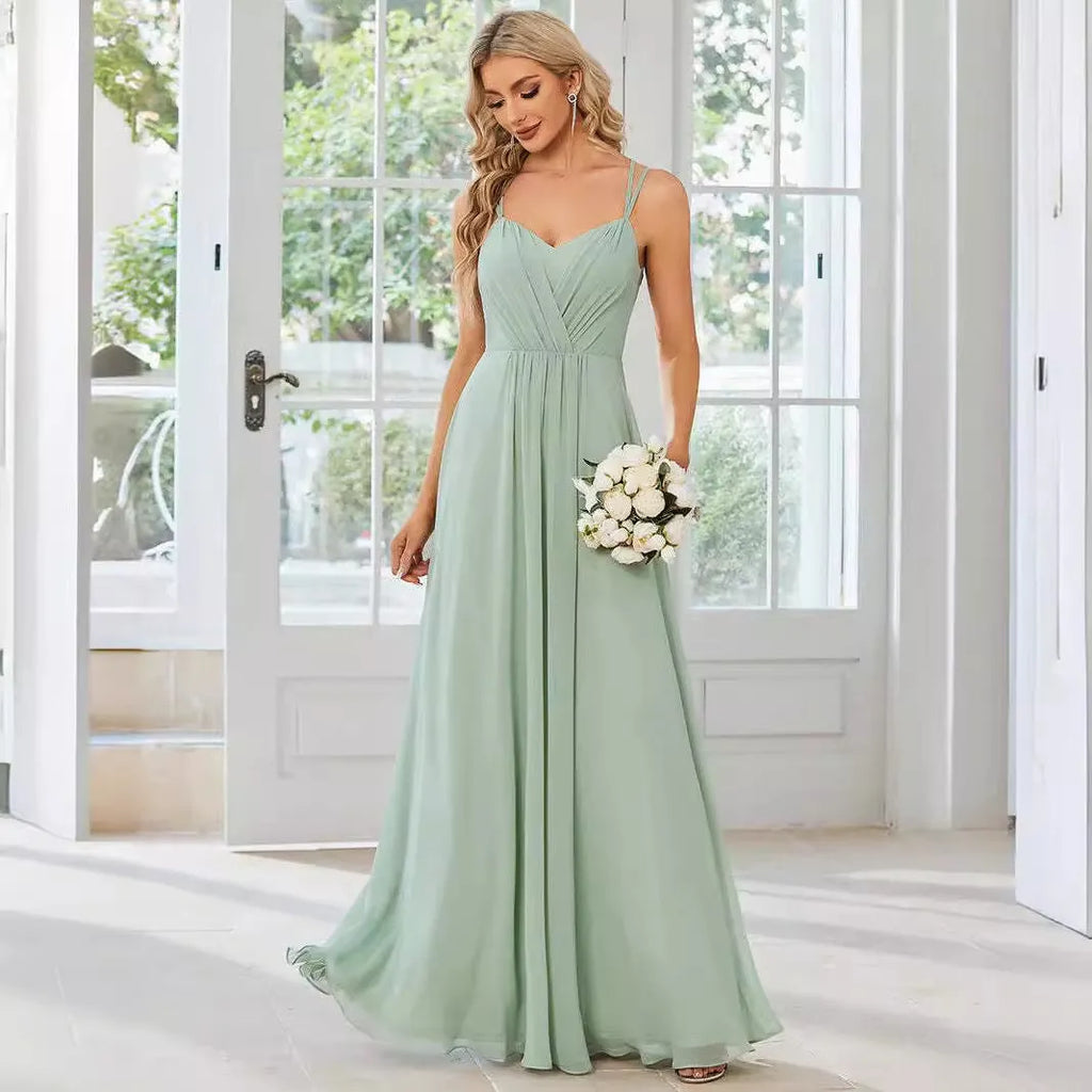 Women's light green sleeveless sling dress with pleated long A-line skirt