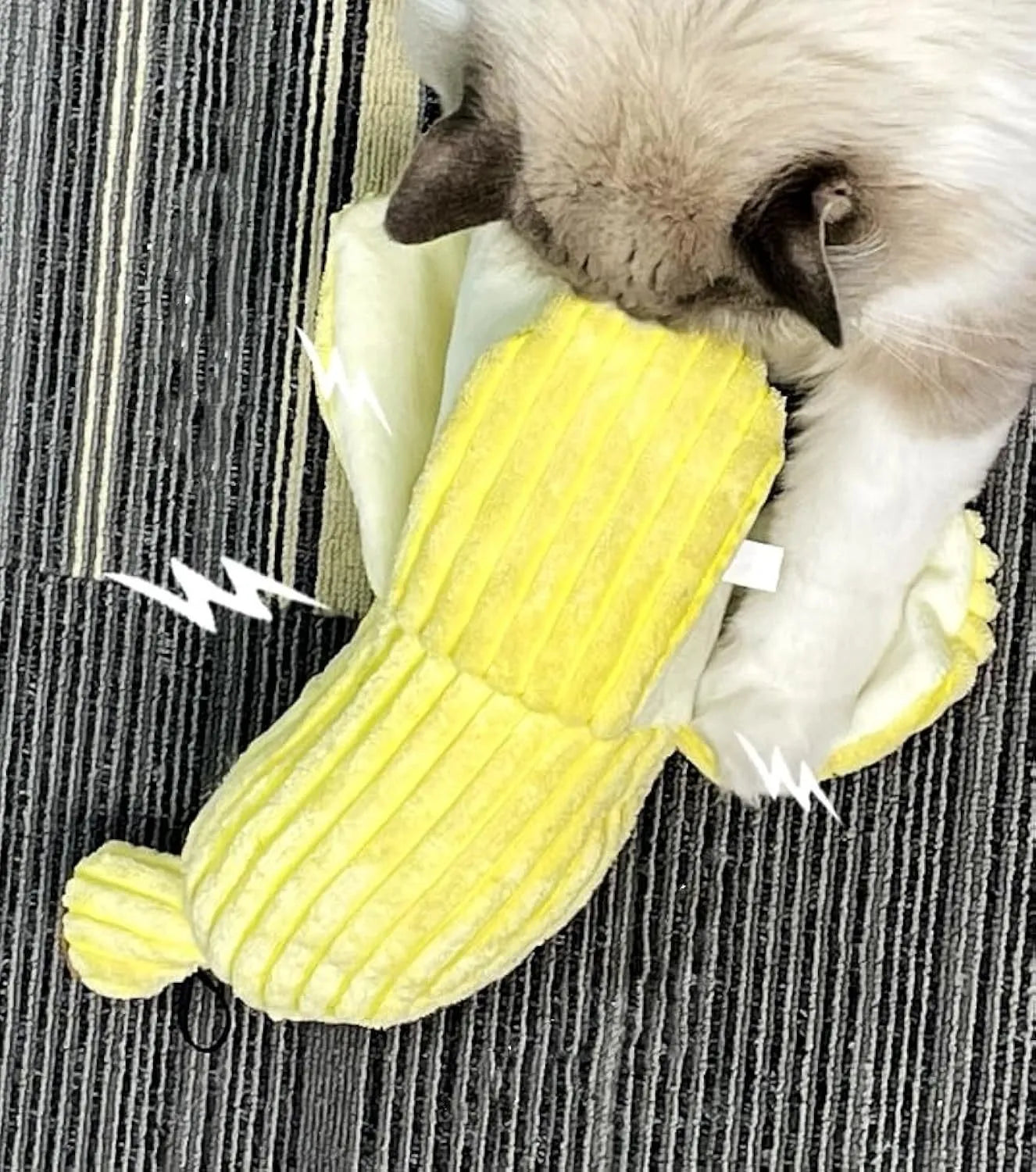Yellow banana-shaped plush cat toy with crinkle paper and velvet texture strip