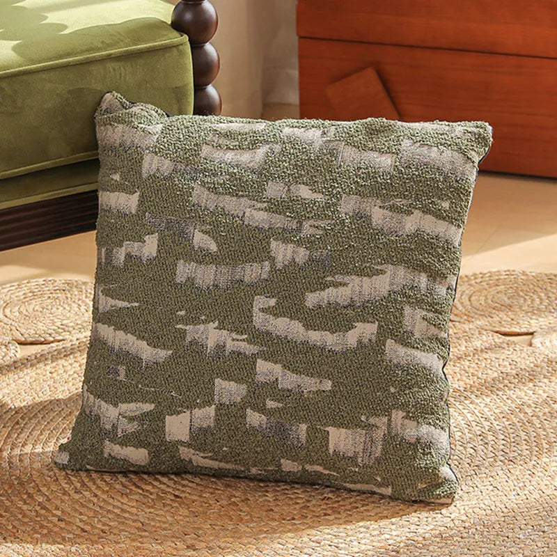 Square pillow cover with woven plant pattern in Nordic style, shown on a sofa as a waist pillow.
