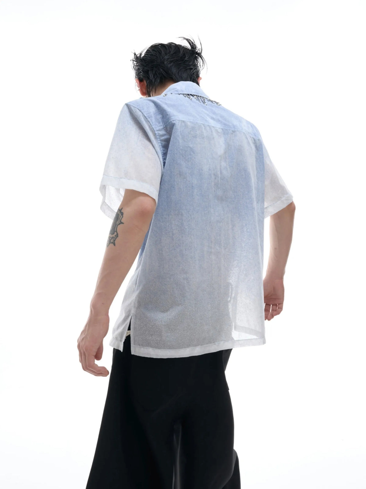 Blue and white gradient loose fit short sleeve men's casual shirt on a hanger