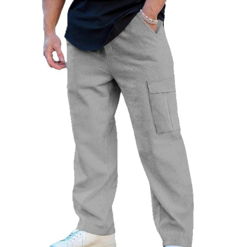 Men's loose-fitting corduroy cargo trousers in a straight wide-leg style with a drawstring waist.