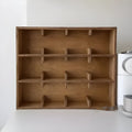 Square birch wood cup storage rack with multiple grid compartments for mug and glass organisation