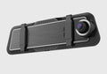 A black dual-lens dashboard camera with a large touchscreen display mounted on a car windshield.