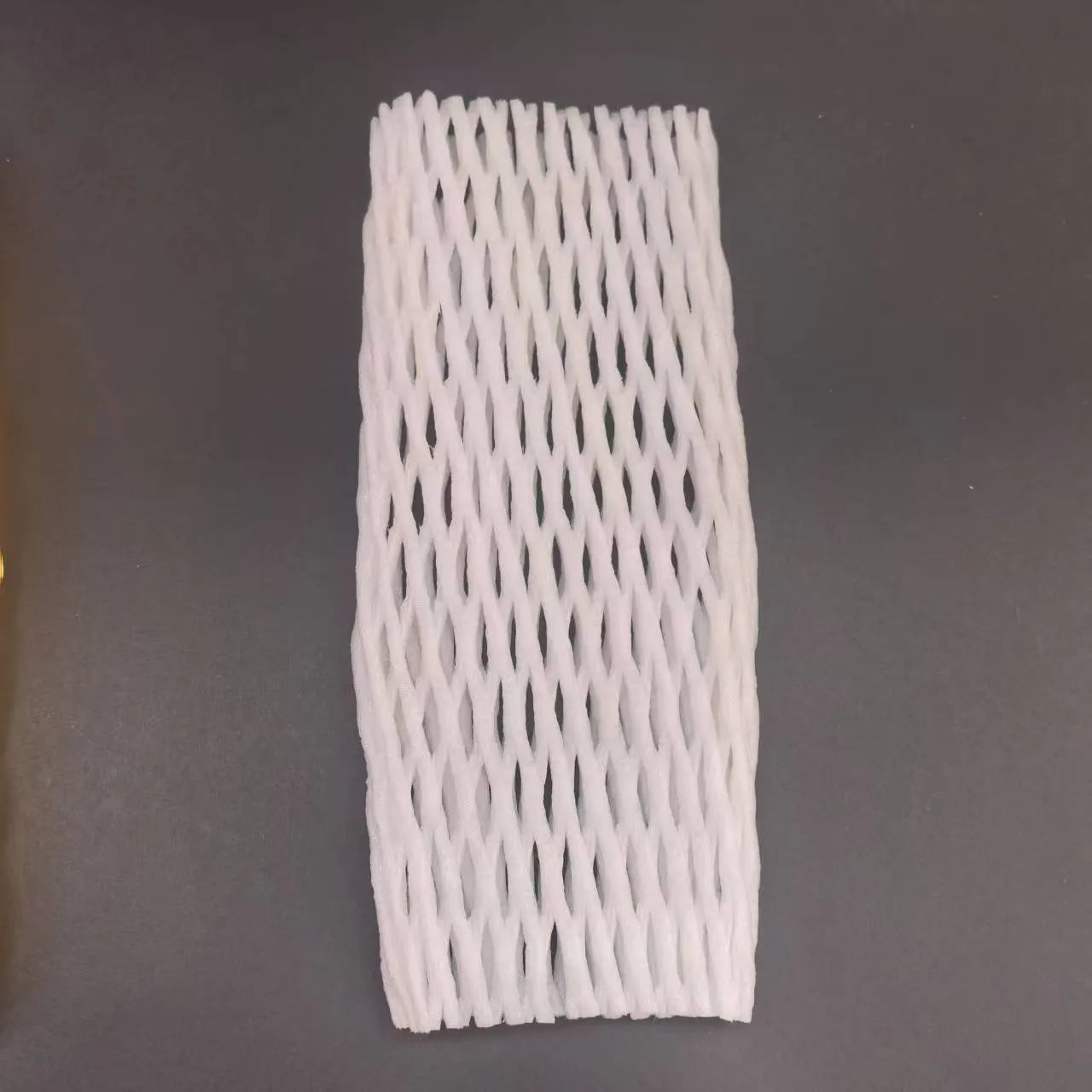White foam net protective cover for fruit packing with hybrid shockproof design