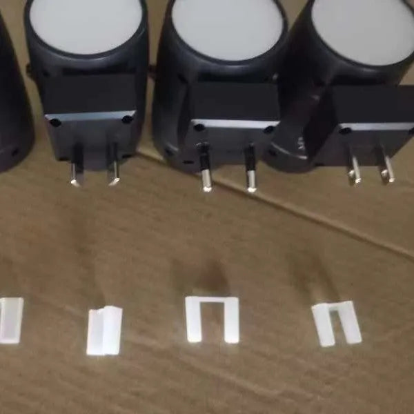 Small white induction night lamp with direct plug and adjustable rotatable head