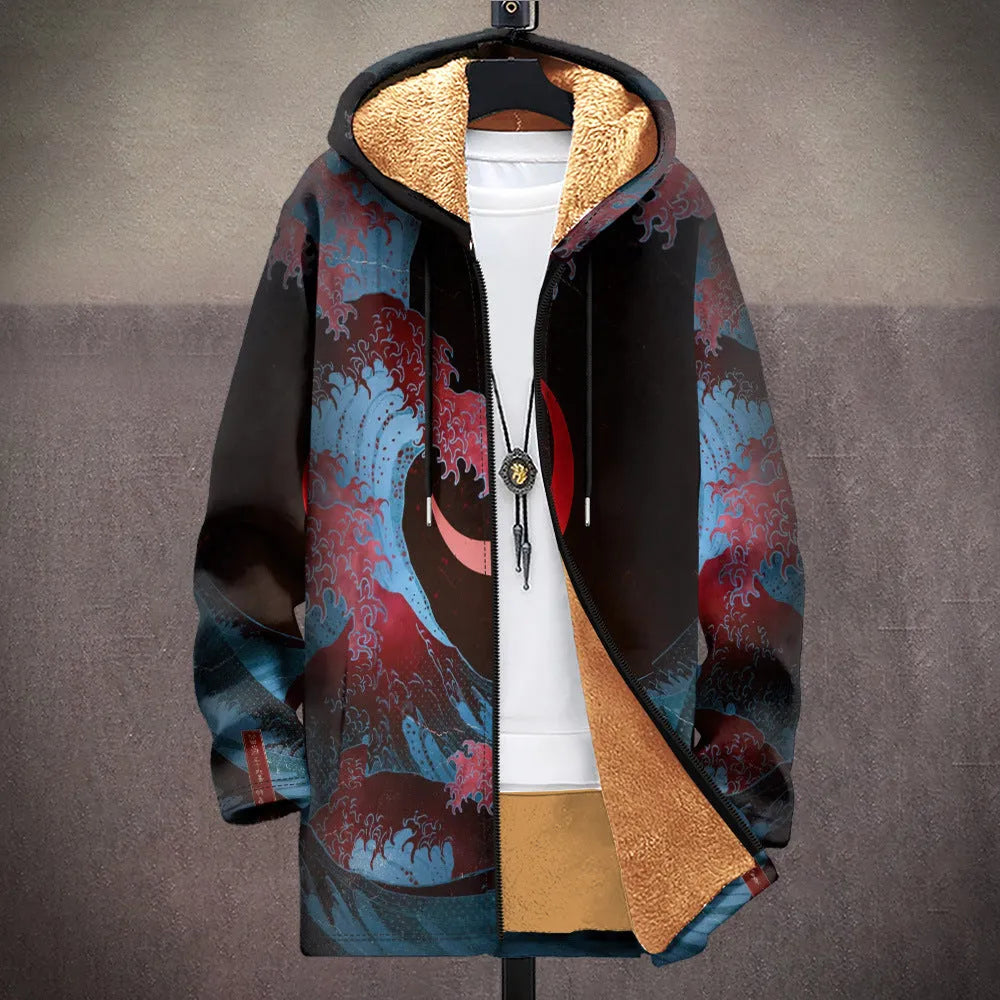Man wearing a loose fit hooded cardigan with a front zipper and digital multicolour print pattern.