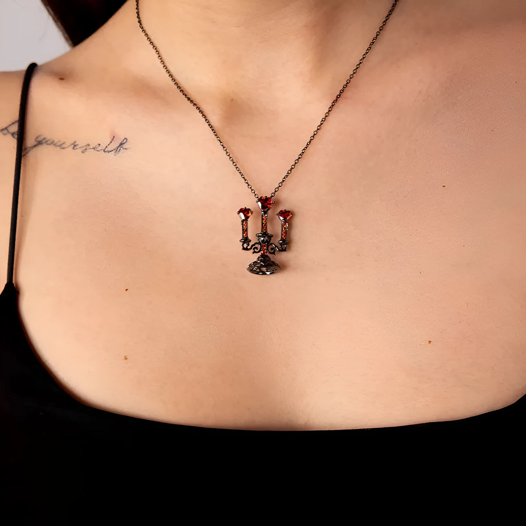Gothic hollow candlestick pendant necklace on a cross chain in retro candlestick colour.