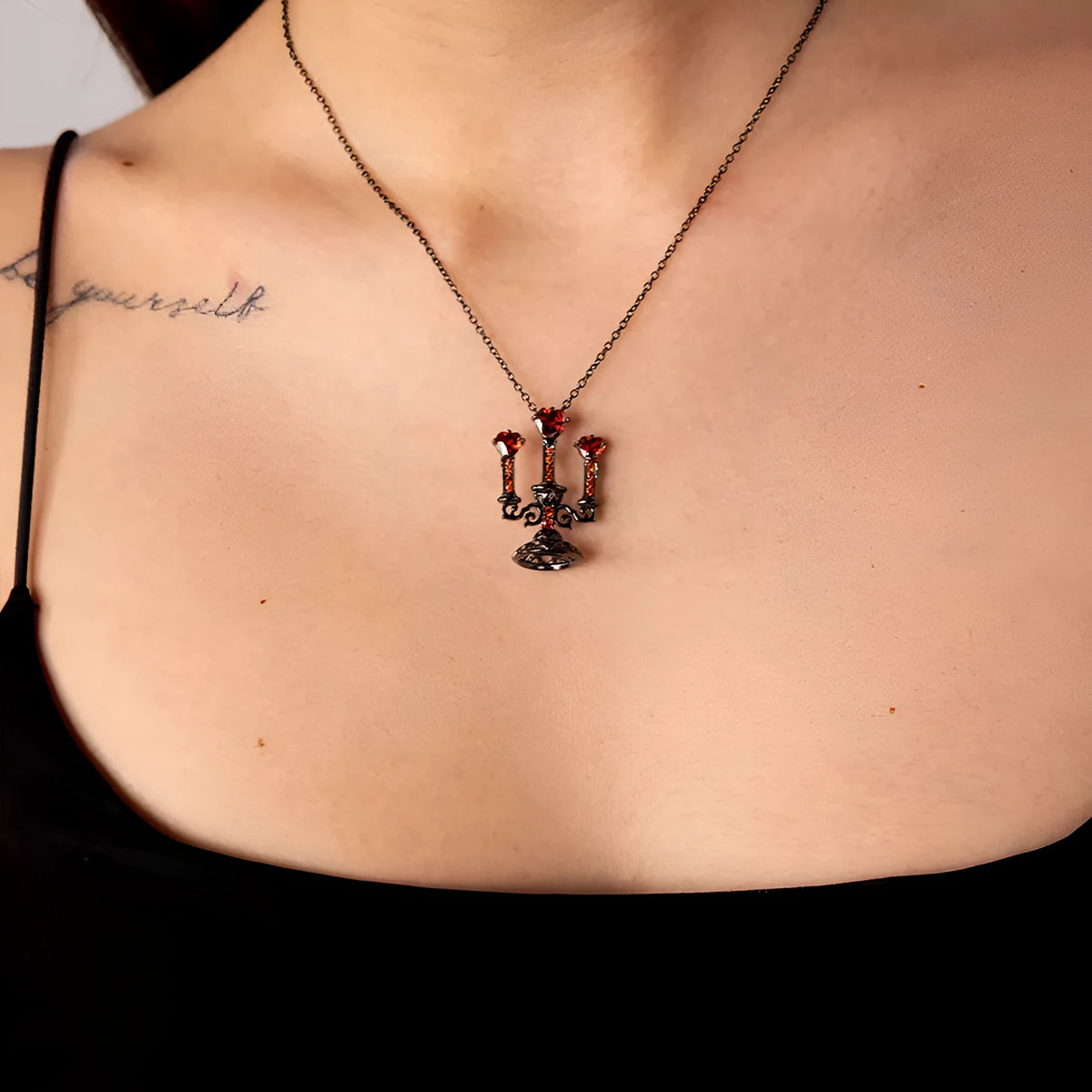 Gothic hollow candlestick pendant necklace on a cross chain in retro candlestick colour.