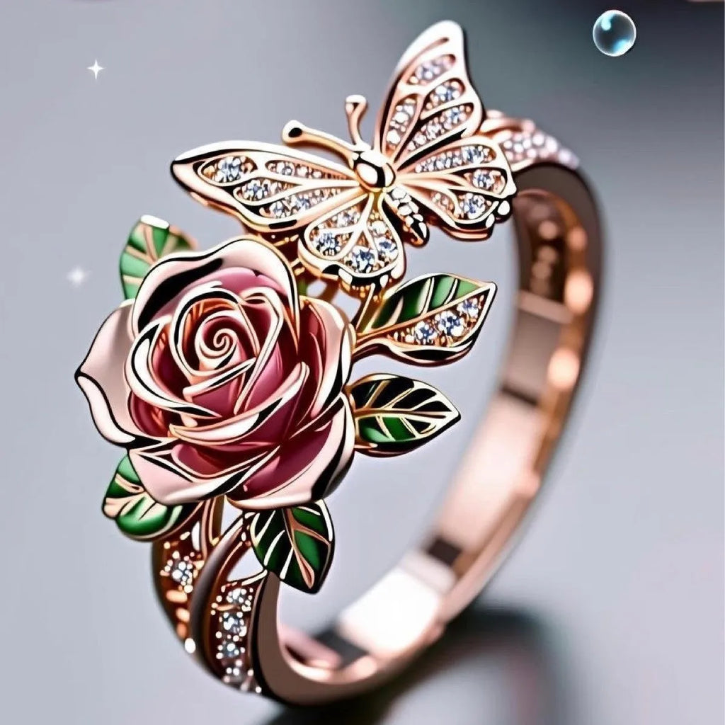Adjustable fairy style ring with colourful oil-drip finish showing butterfly and rose motifs