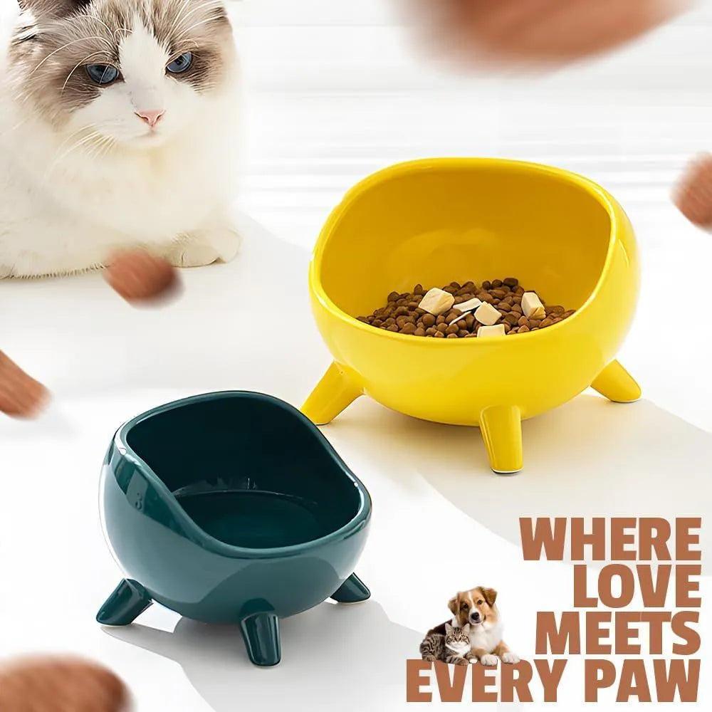 Green ceramic pet bowl with four legs and wide opening for cat or small dog feeding