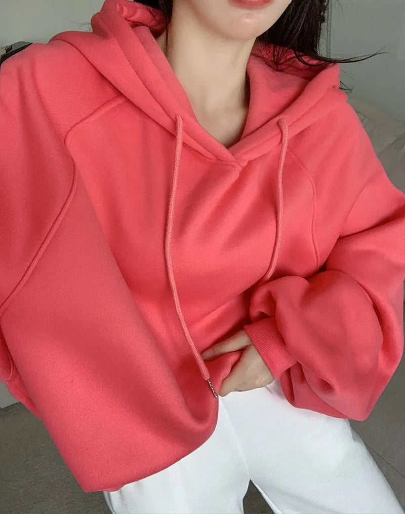 Watermelon red sleeveless Mulberry Silk hooded sweater on a hanger, showing loose fit and solid colour.