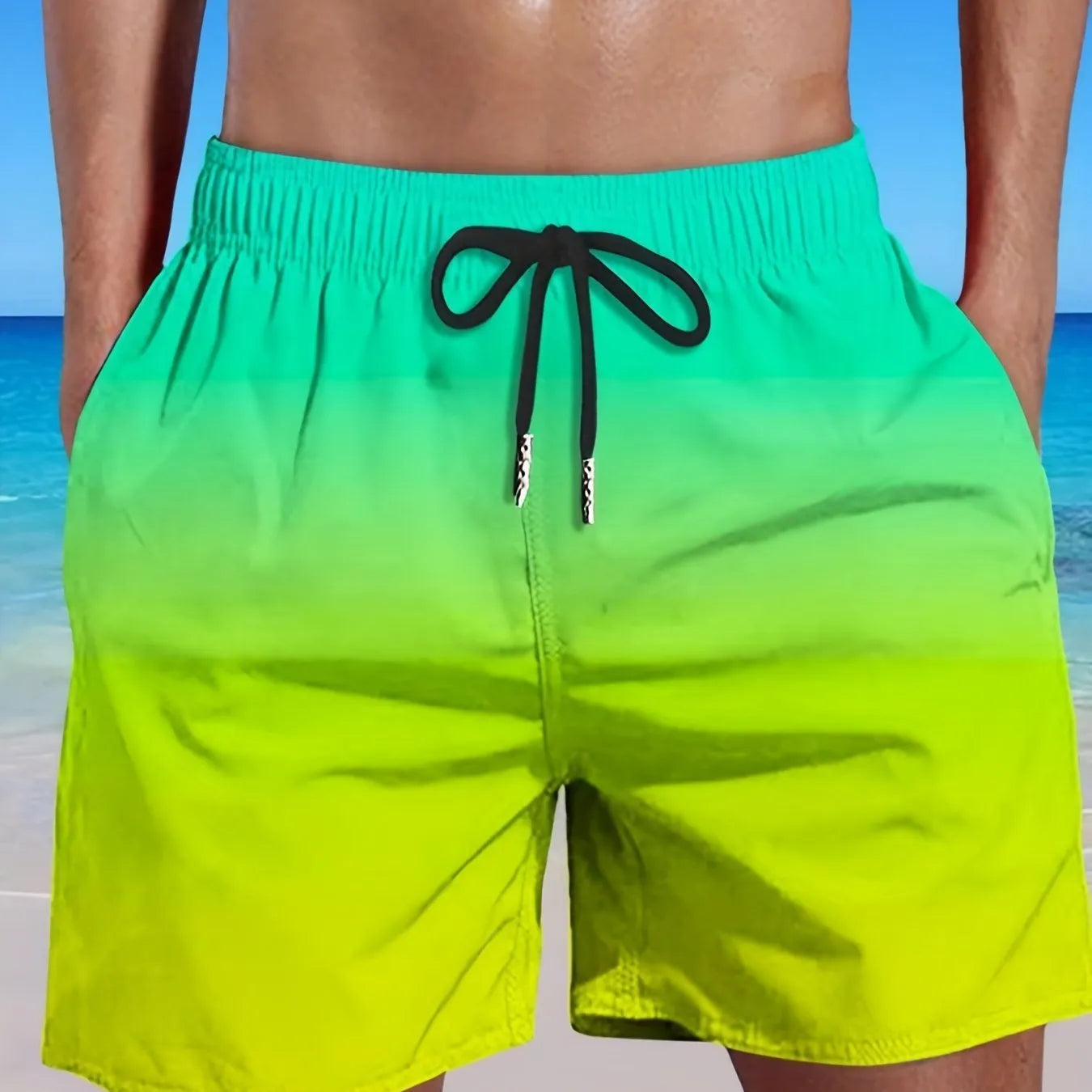 Men's grey gradient 3D printed mesh sports shorts on a white background.