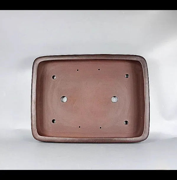 Handmade antique rectangular purple clay flower pot showing traditional finish