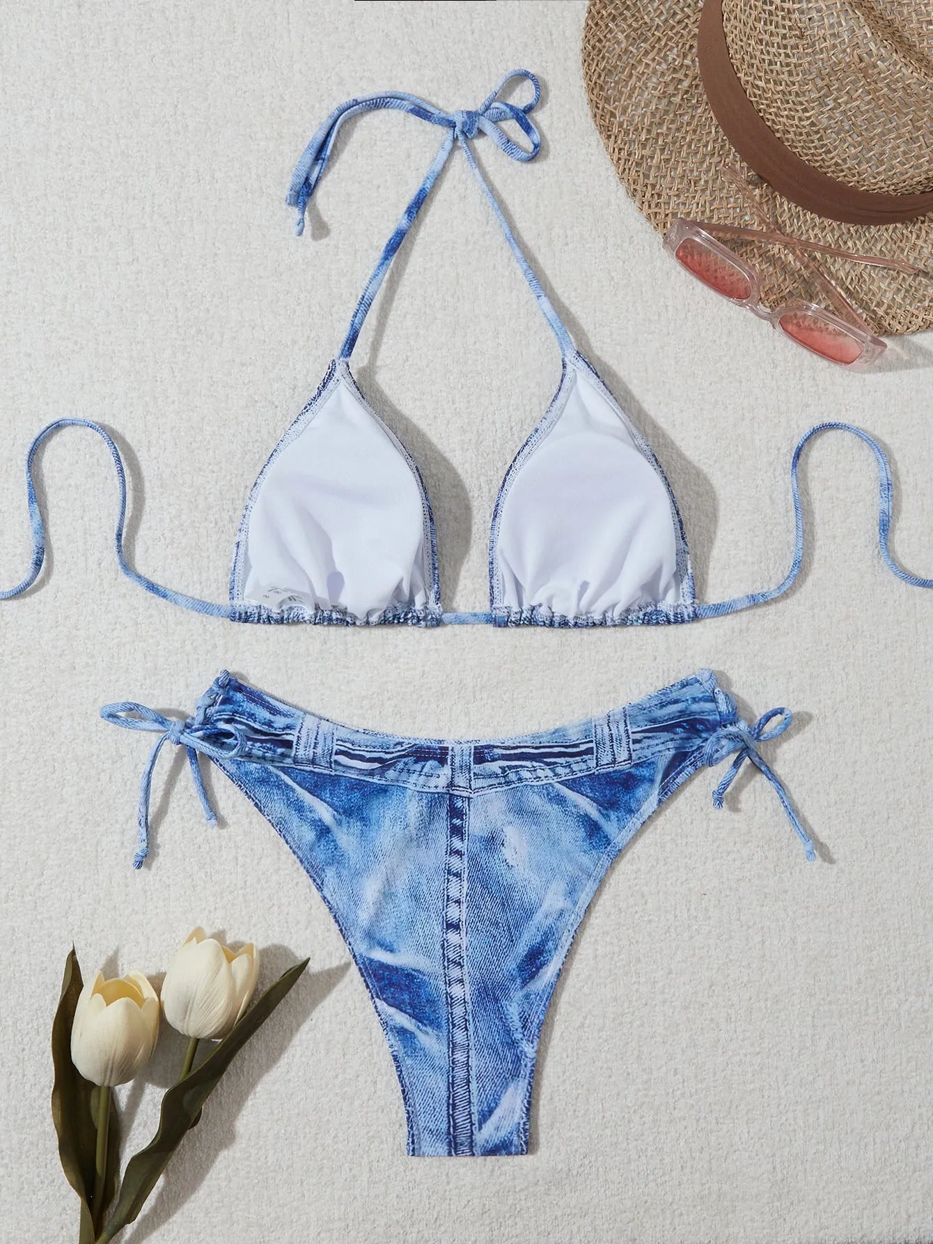 Women's denim blue printed strap bikini set on white background