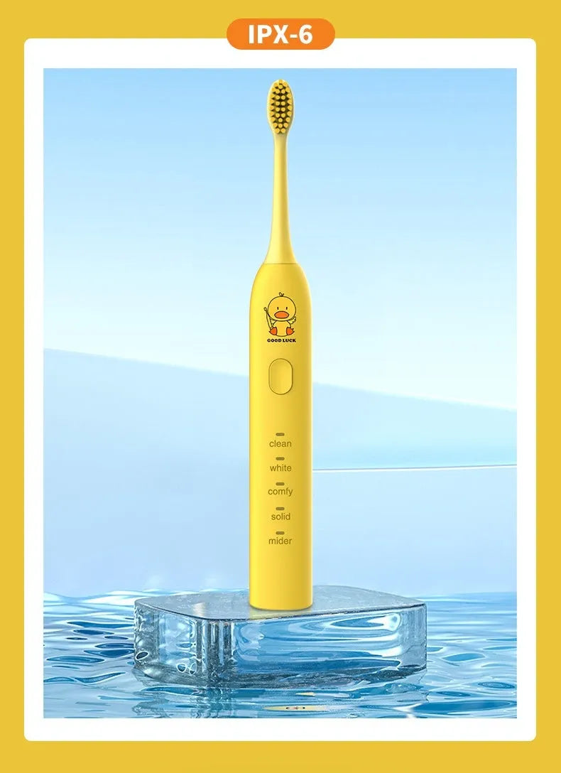 Yellow rechargeable smart electric toothbrush with soft bristles and a small duck design.