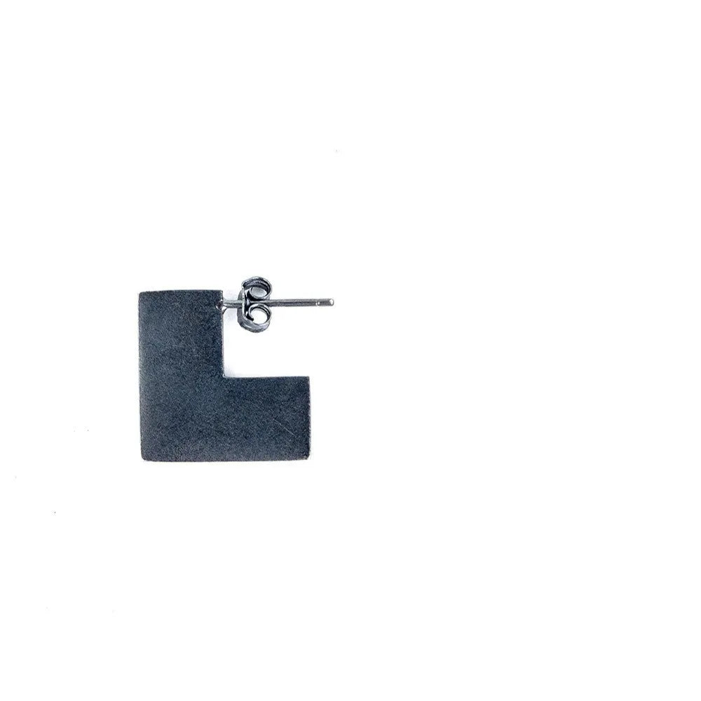 Oxidation black geometric square sterling silver earring ring on a 16mm scale.