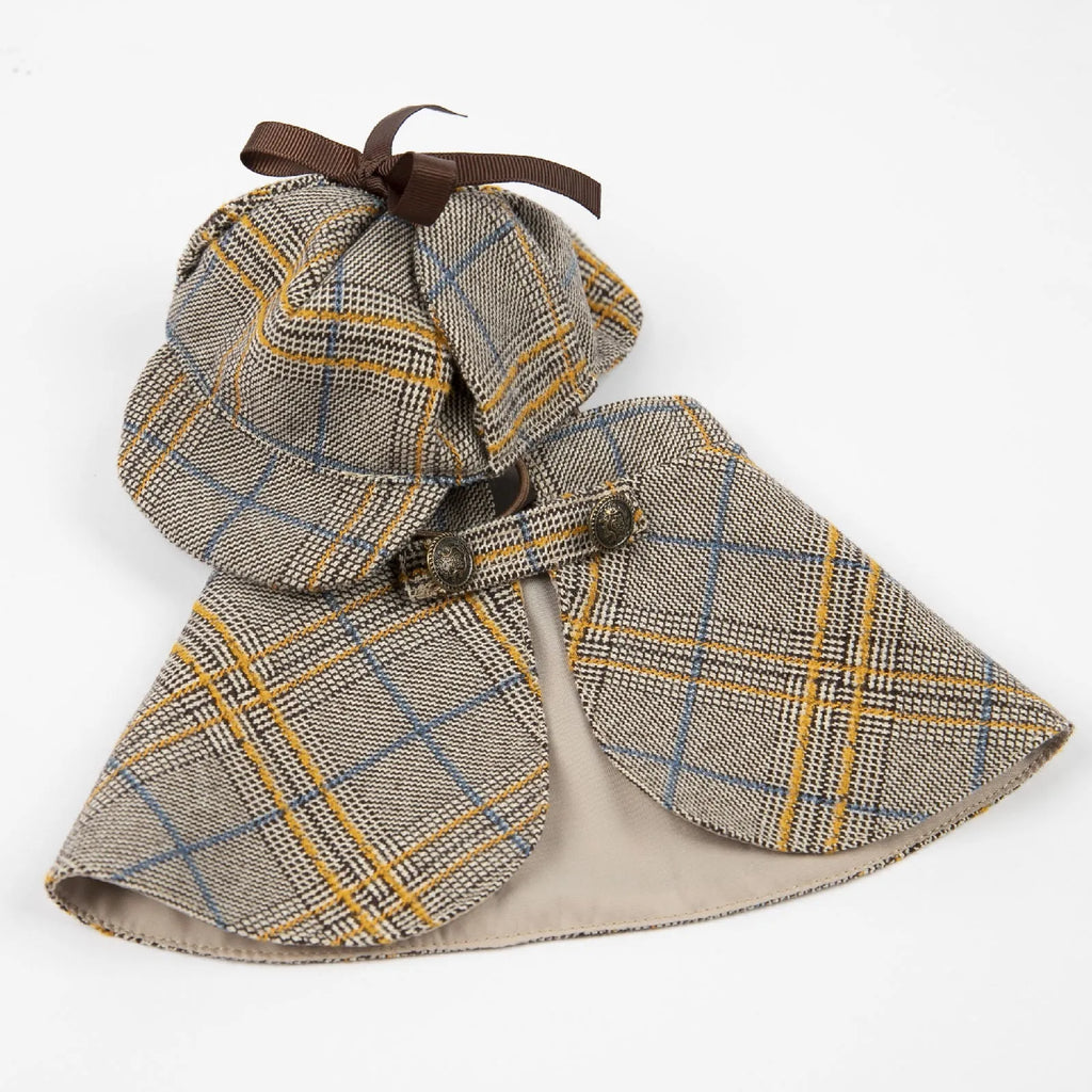 Camel-coloured cotton detective cloak costume for a dog, featuring an adjustable hat.