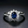 Blue moissanite women's ring with electroplated copper floral design and zirconium inlay details