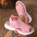 Women's platform sports sandals in pink with mesh lining and a flat toe bracket design.