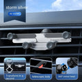Invisible alloy snap-on mobile phone holder for car air vent in black, silver and grey colours.