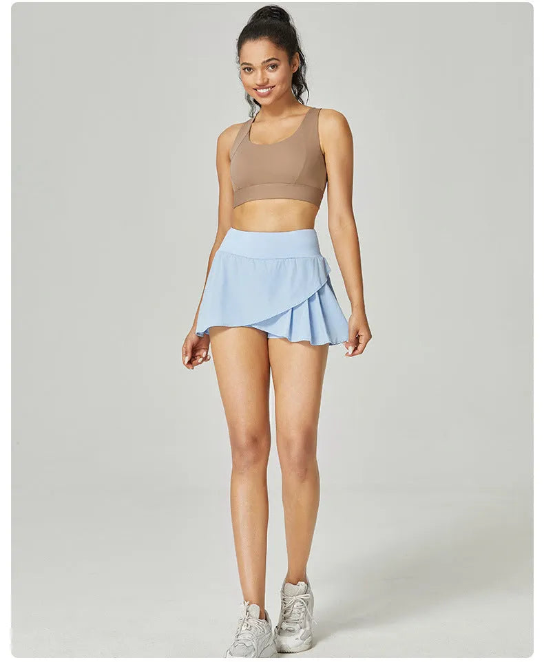Women's solid colour quick-dry sports shorts in nylon with spandex lining, shown in multiple colours.