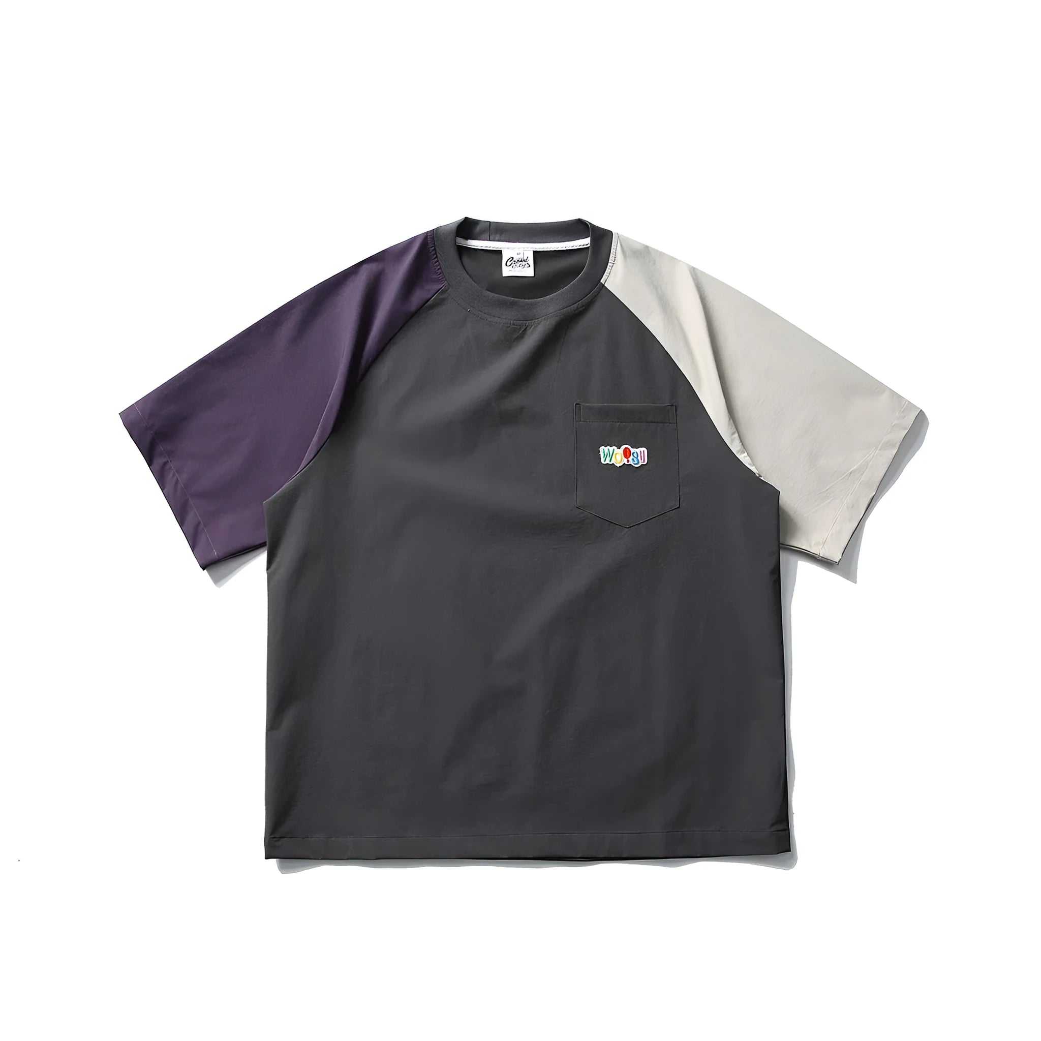 Dark grey men's loose fit T-shirt with contrast colour raglan sleeves on a hanger.